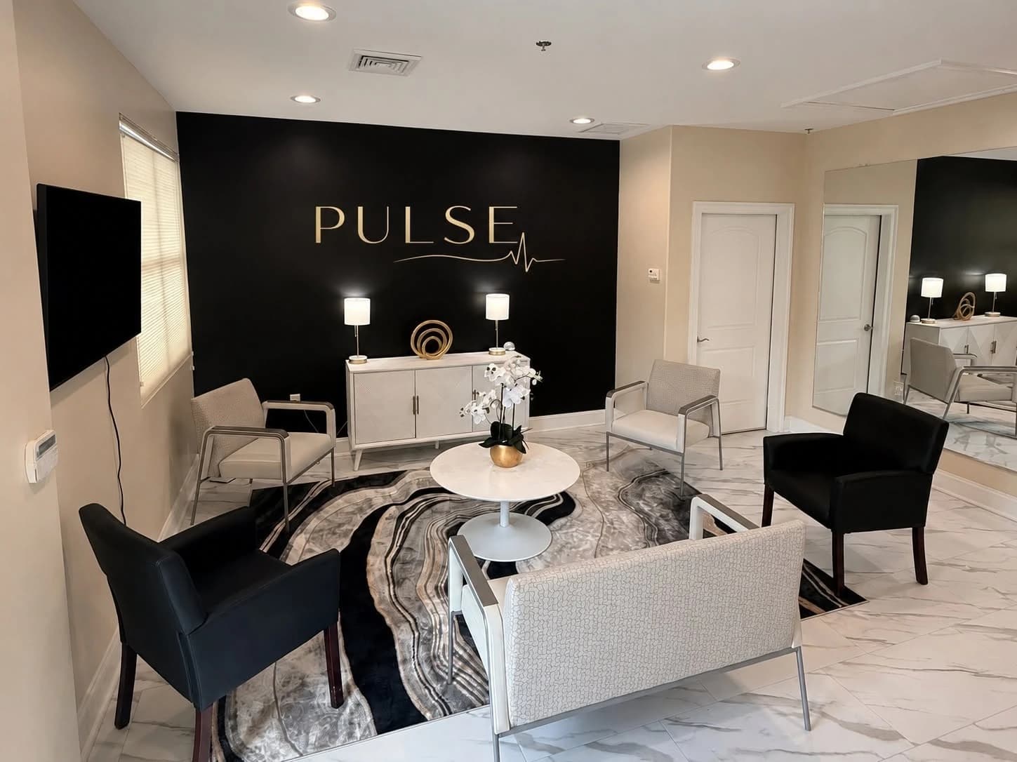 Pulse Biohacking Sanctuary Office with Matte Black Feature Wall